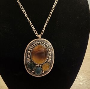 Elegant Silver Pendant Necklace with Brown and Green Stones